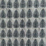 Detail of fabric woven in a repeating leaf print in shades of navy and gray.