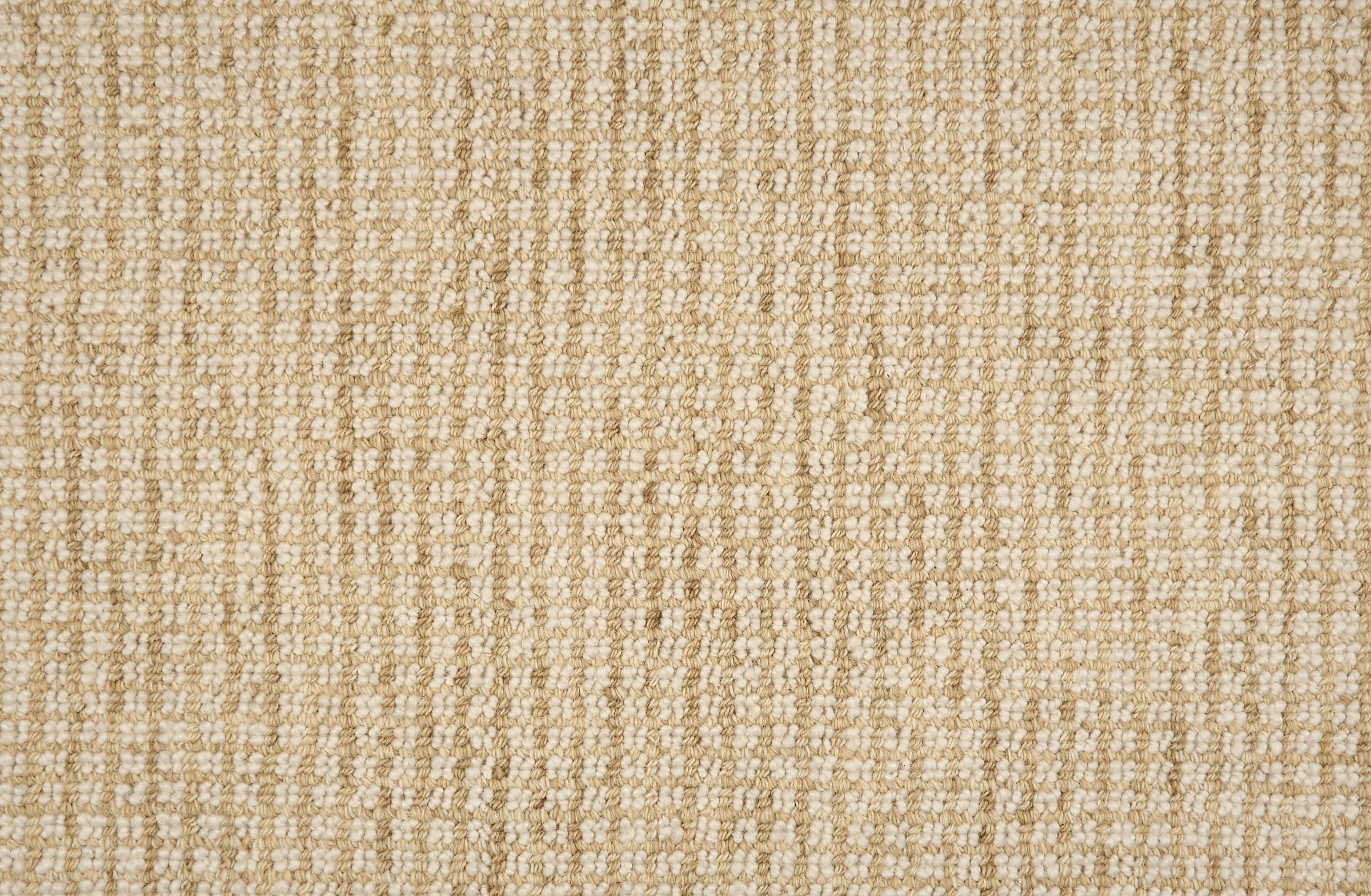 Broadloom carpet in a textural checkered pattern in ivory and tan.