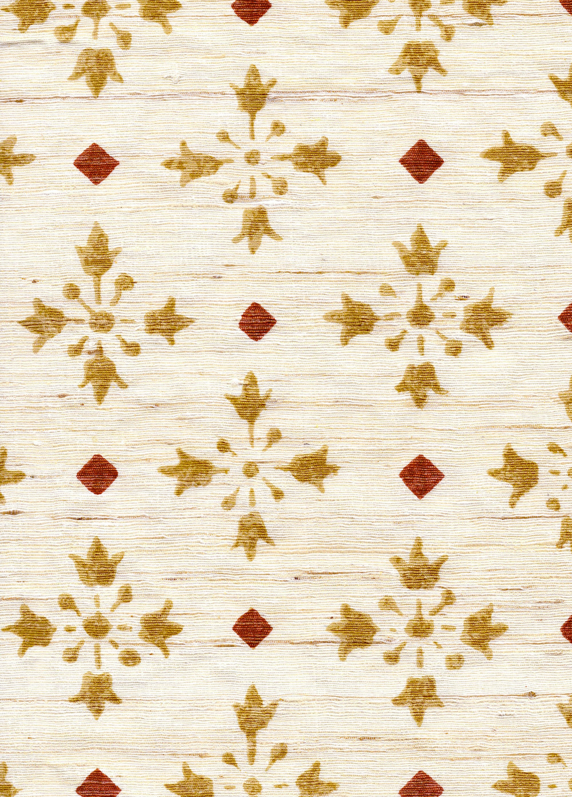 Detail of fabric in a botanical grid print in red and metallic gold on a cream field.