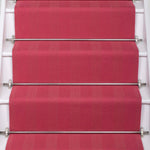 Striped flatweave runner in pink on white staircase