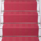 Striped flatweave runner in pink on white staircase