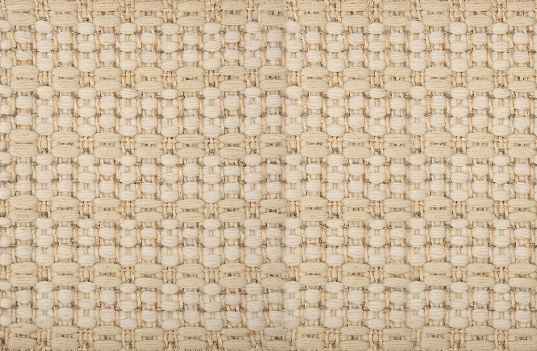 Broadloom carpet in a textural weave in beige. 