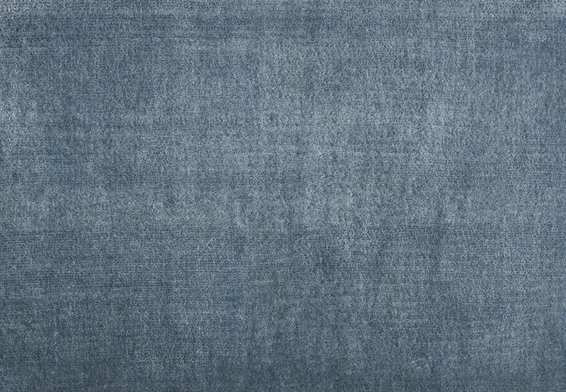 Broadloom carpet swatch in a solid pattern in a blue design