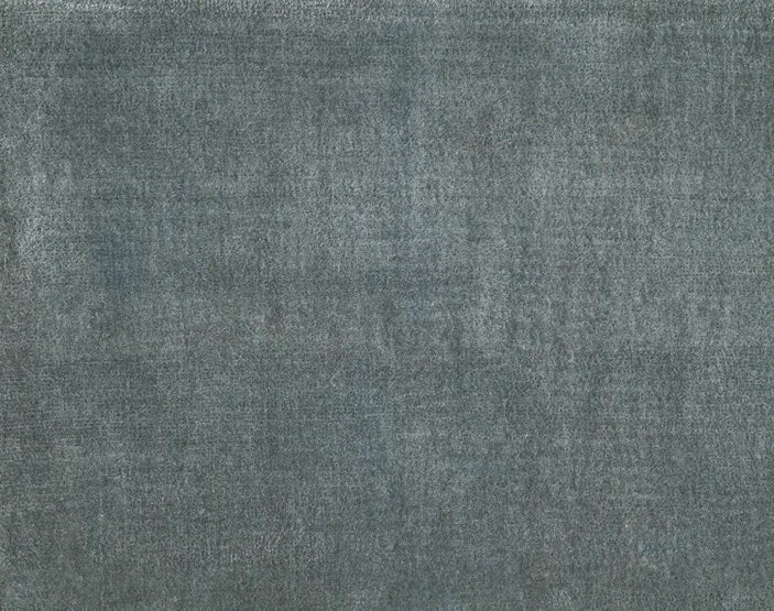 Broadloom carpet swatch in a solid pattern in a blue green grey design