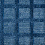 Broadloom carpet swatch in a checkered pattern in a blue design