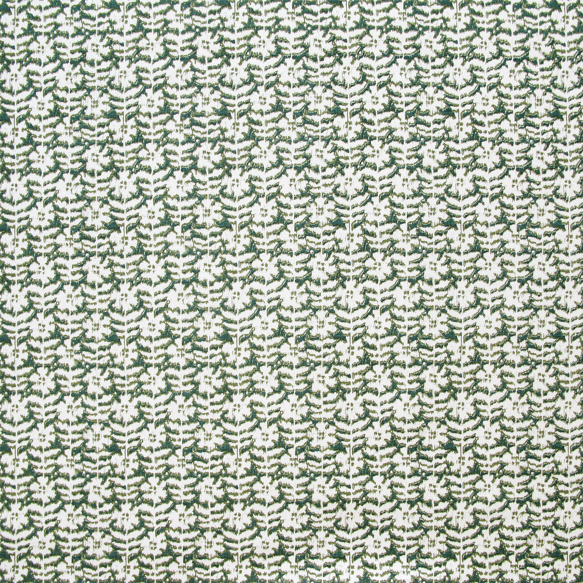 Detail of fabric in a floral grid print in white on a forest green field.