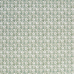 Detail of fabric in a floral grid print in white and sage on a light green field.