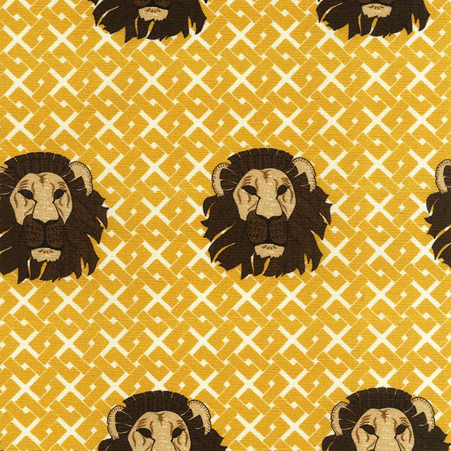 Detail of fabric in a repeating lion face print on a geometric field in shades of brown and yellow.