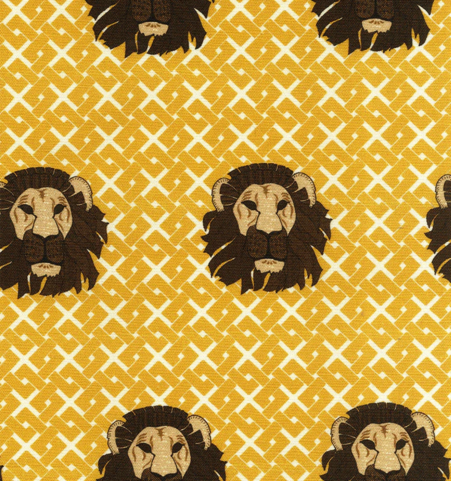 Detail of fabric in a repeating lion face print on a geometric field in shades of brown and yellow.