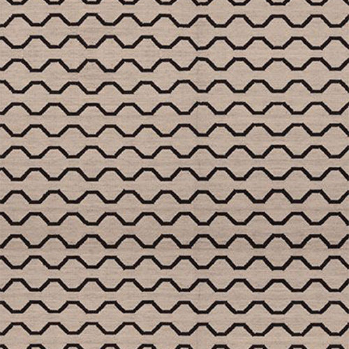 Flatweave rug with a black zig zag stripe on a cream background 