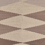 Patterned  rug with brown and beige triangles