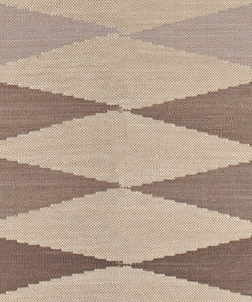 Patterned  rug with brown and beige triangles