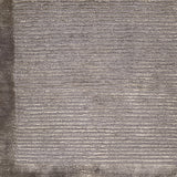 Handknotted rug with border and subtle rib design in grey