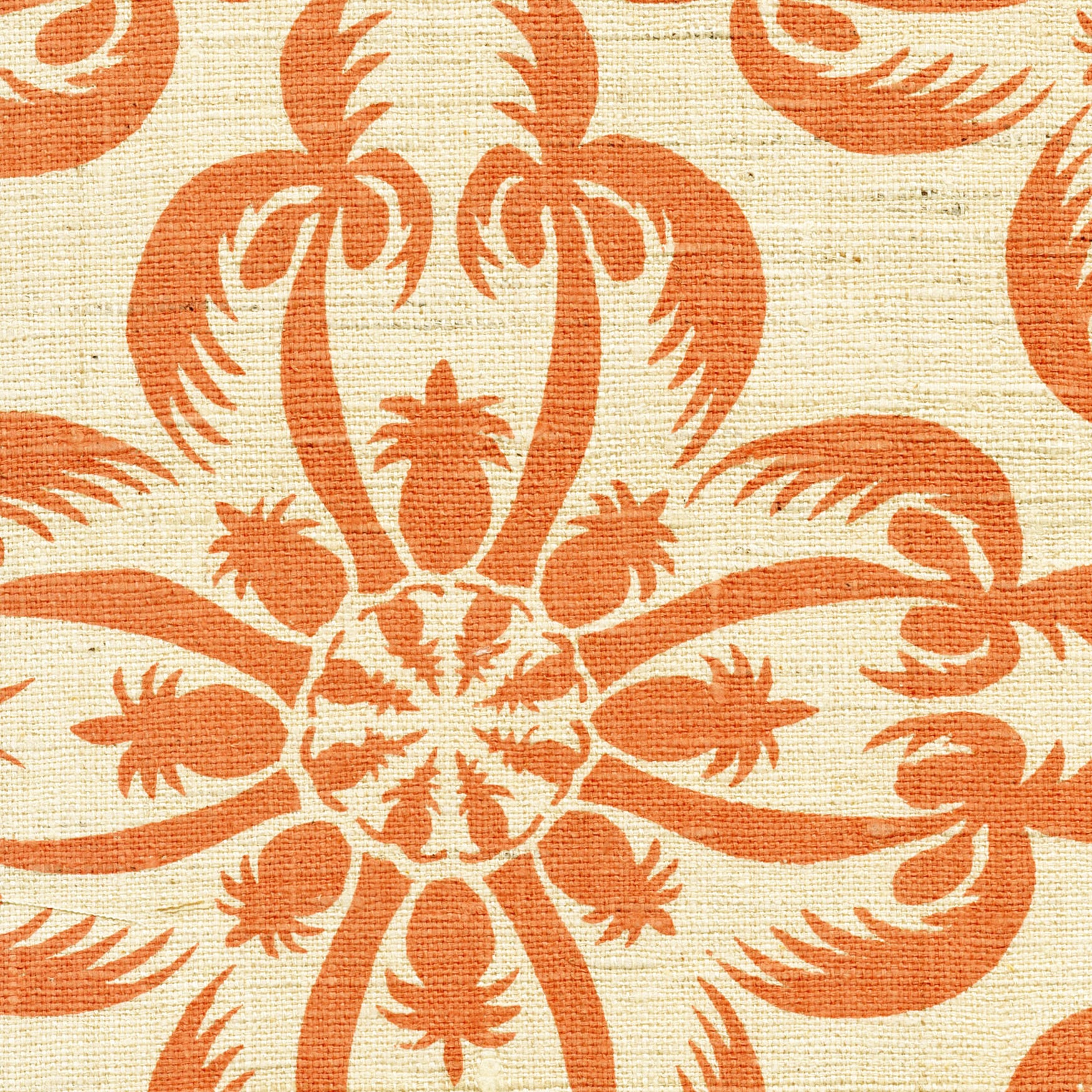 Detail of fabric in a playful botanical print in orange on a cream field.