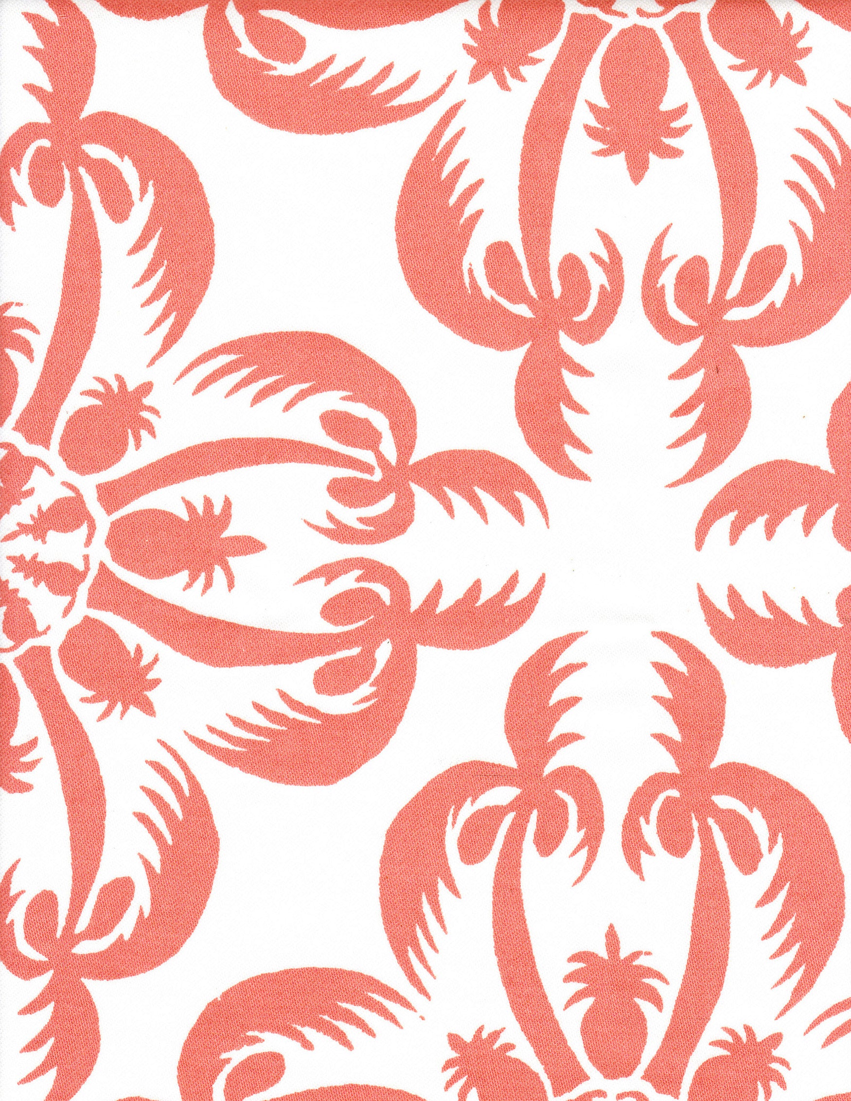 Detail of fabric in a playful botanical print in coral on a white field.