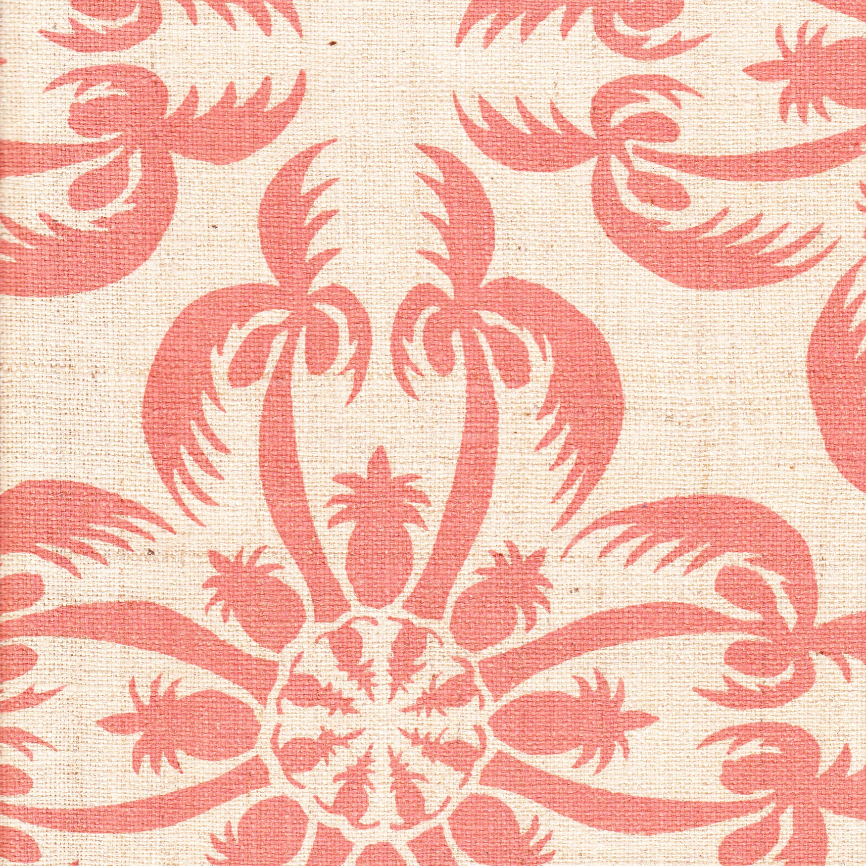 Detail of fabric in a playful botanical print in pink on a cream field.