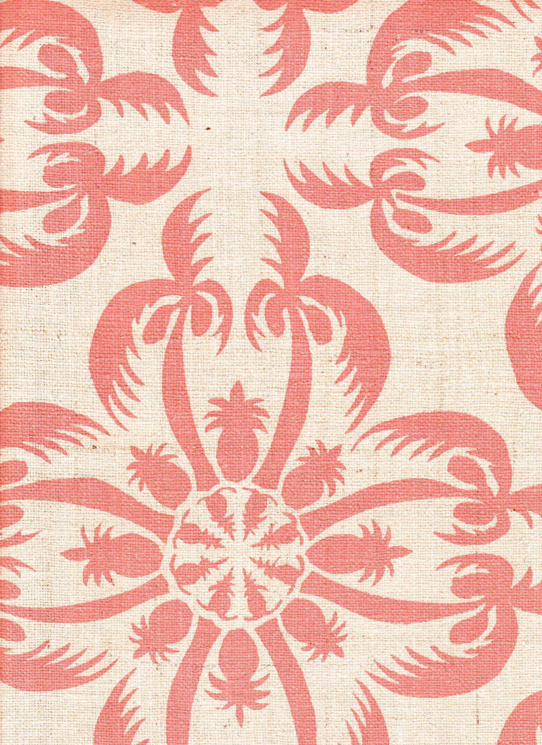 Detail of fabric in a playful botanical print in pink on a cream field.