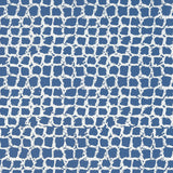 Detail of wallpaper in an abstract grid print in blue on a light gray field.