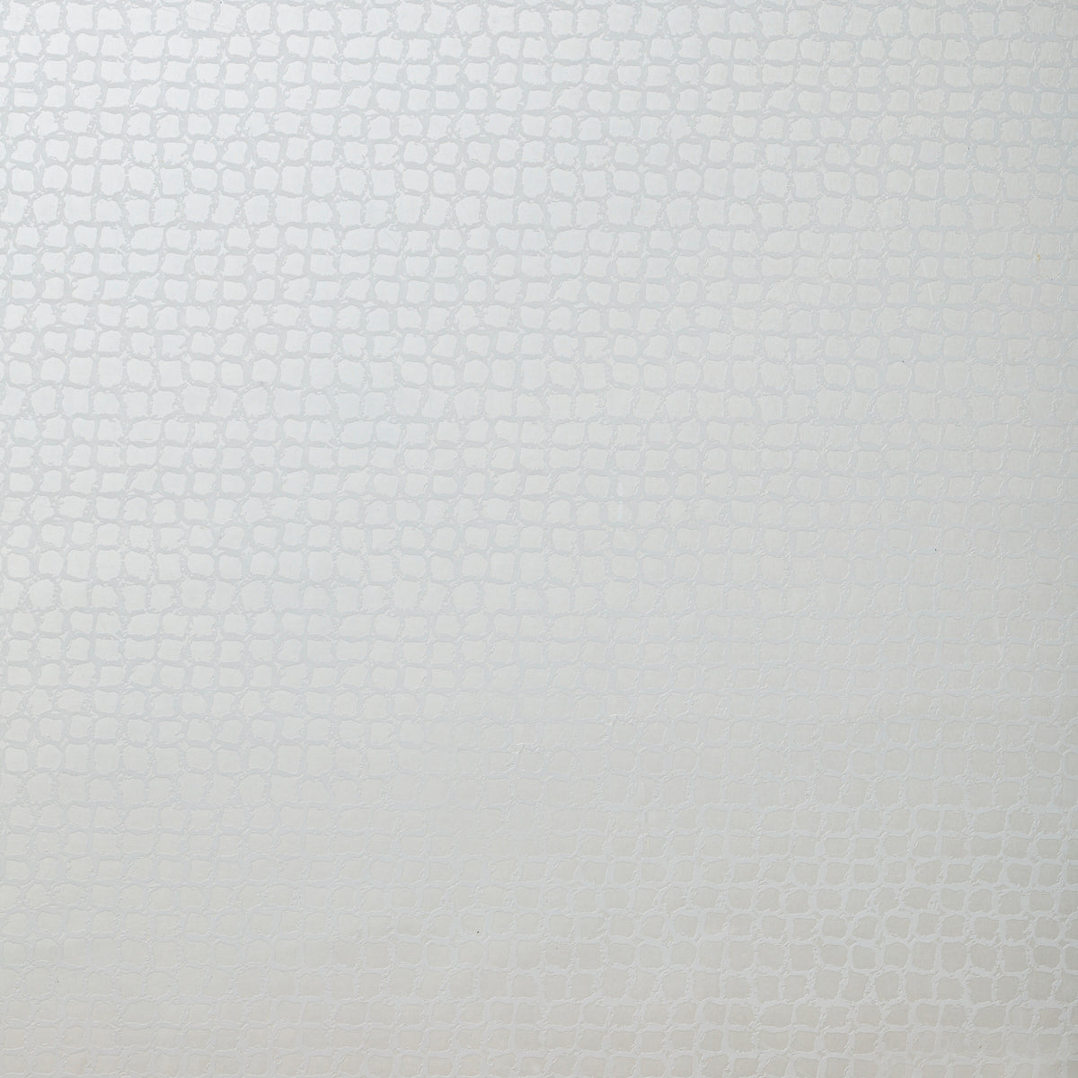 Detail of wallpaper in an abstract grid print in light gray.