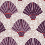 Detail of fabric in a playful fan print in purple and red on a mottled cream field.