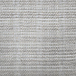 Broadloom carpet in slim plaid pattern in cream and beige.