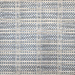Broadloom carpet in slim plaid pattern in cream and light blue.