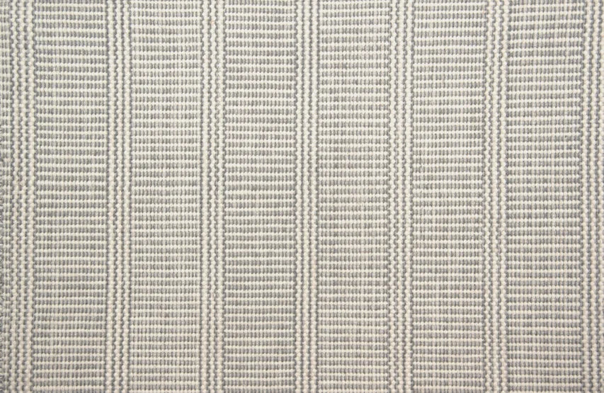 Broadloom carpet swatch in a striped pattern in a grey design