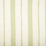 Detail of fabric in a small-scale botanical stripe print in green on a cream field.