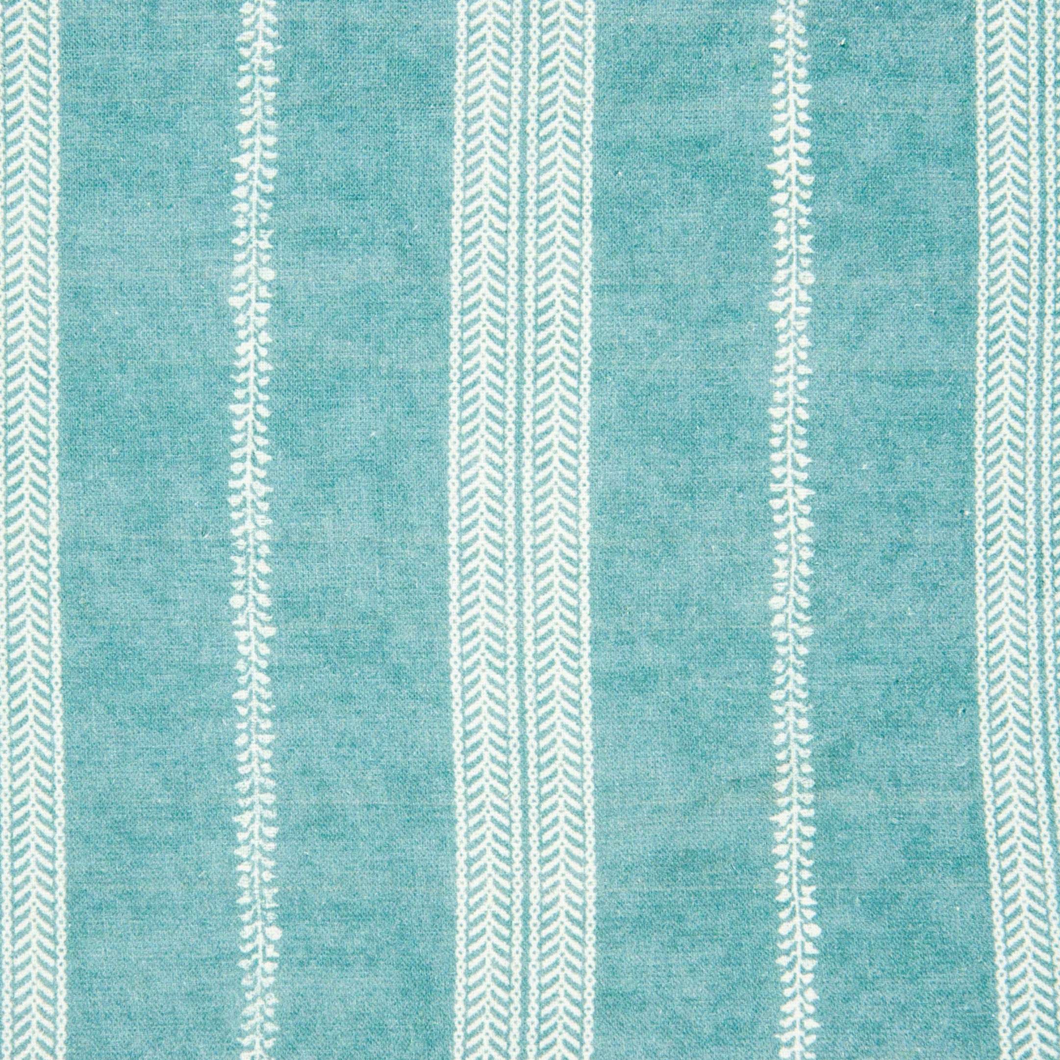 Detail of fabric in a small-scale botanical stripe print in white on a teal field.