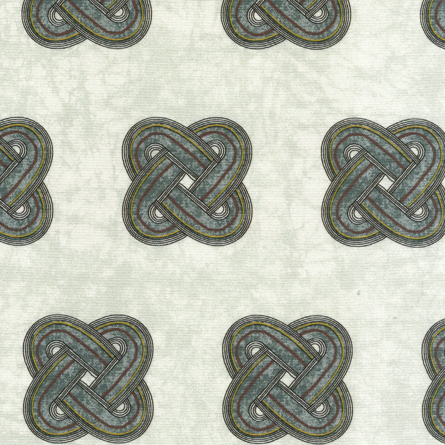 Detail of fabric in a repeating knot print in gray and yellow on a gray field.