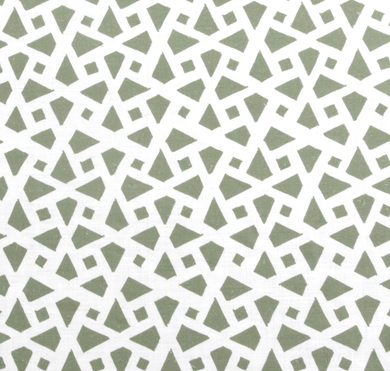 Detail of fabric in a geometric lattice print in sage on a white field.