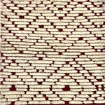 Handknotted Moroccan style rug with a raised ivory cut pile motif. 