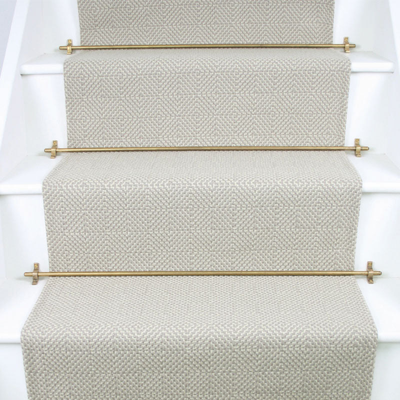 Diamond geometric flatweave runner in neutral on white staircase