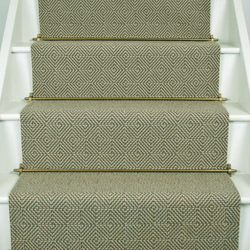 Diamond geometric flatweave runner in green on white staircase