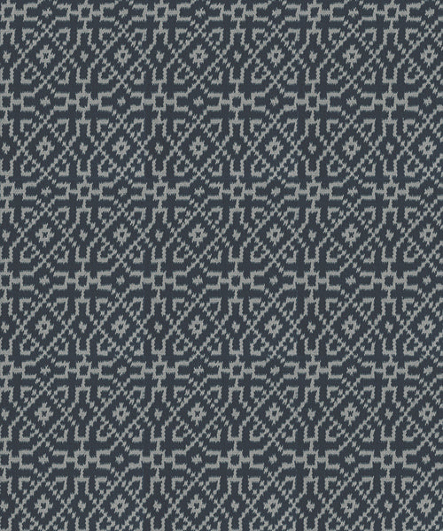 Textured rug with a geometric pattern in turquoise on black