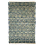 Handknotted rug sample with fringe edges in a basketweave design in blue and grey on a white background. 