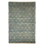 Handknotted rug sample with fringe edges in a basketweave design in blue and grey on a white background. 