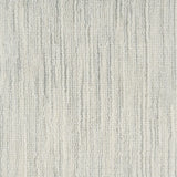 Broadloom carpet in a textural striated pale grey. 