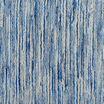Broadloom carpet in a textural striated blue and white.