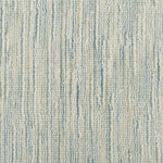 Broadloom carpet in a textural striated sage green.