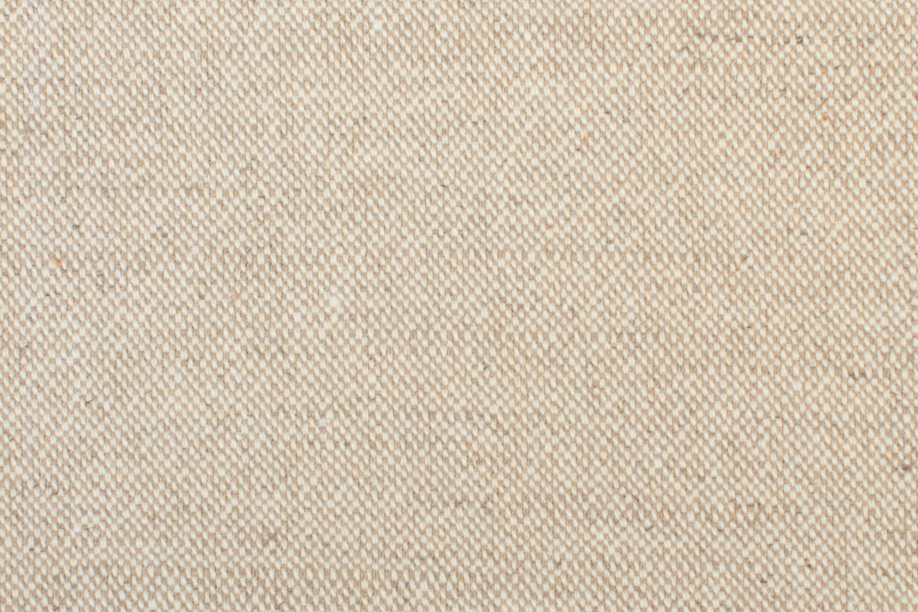 Detail of woven fabric yardage in textured cream and tan.