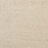 Detail of woven fabric yardage in textured cream and tan.