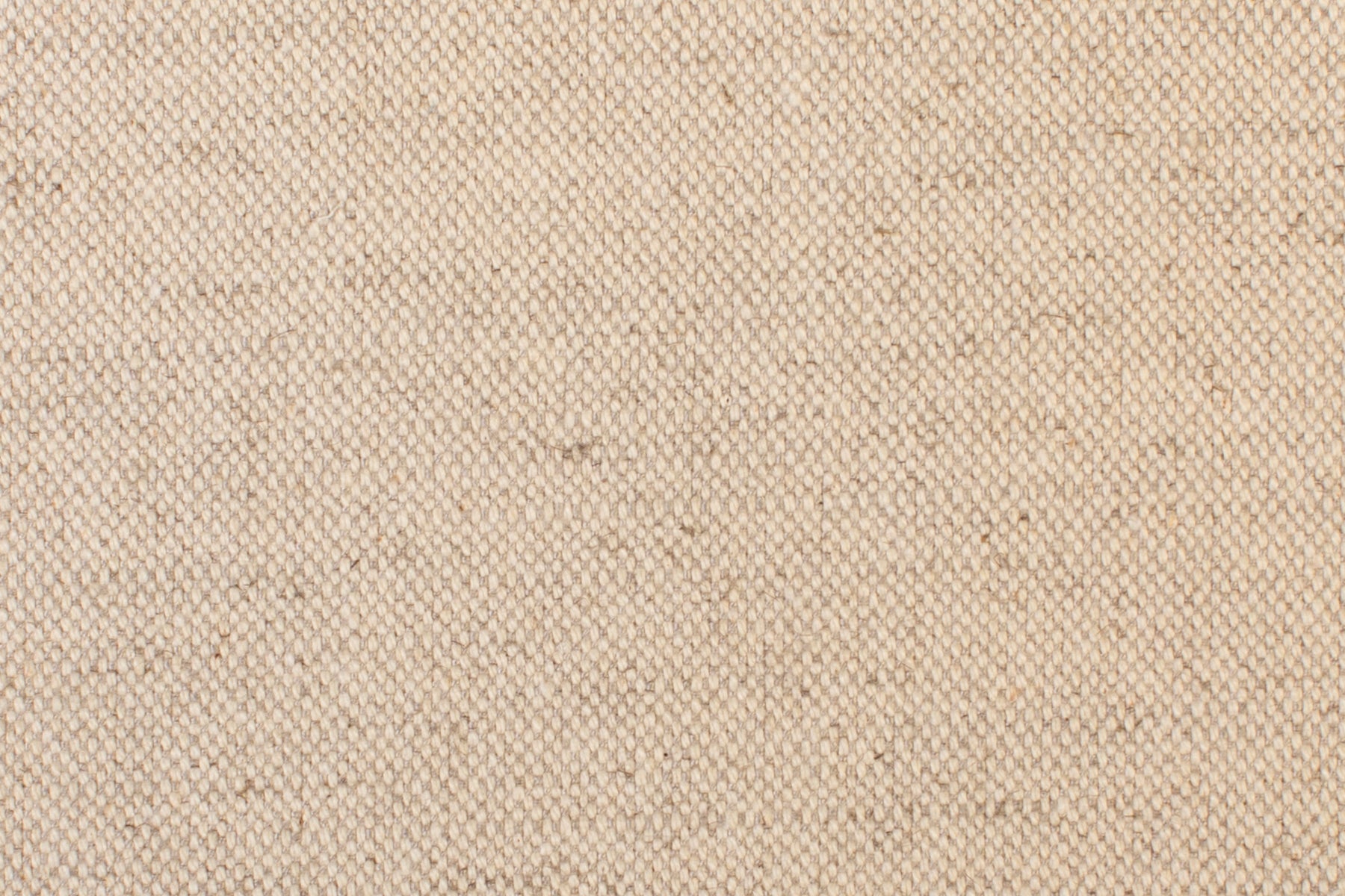 Detail of woven fabric yardage in tan.