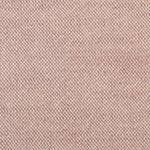 Detail of woven fabric yardage in textured cream and pink.