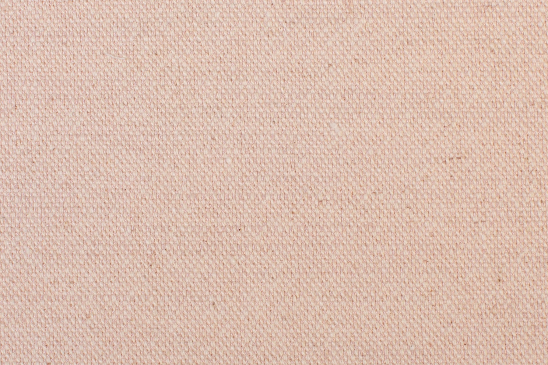 Detail of woven fabric yardage in textured pink.