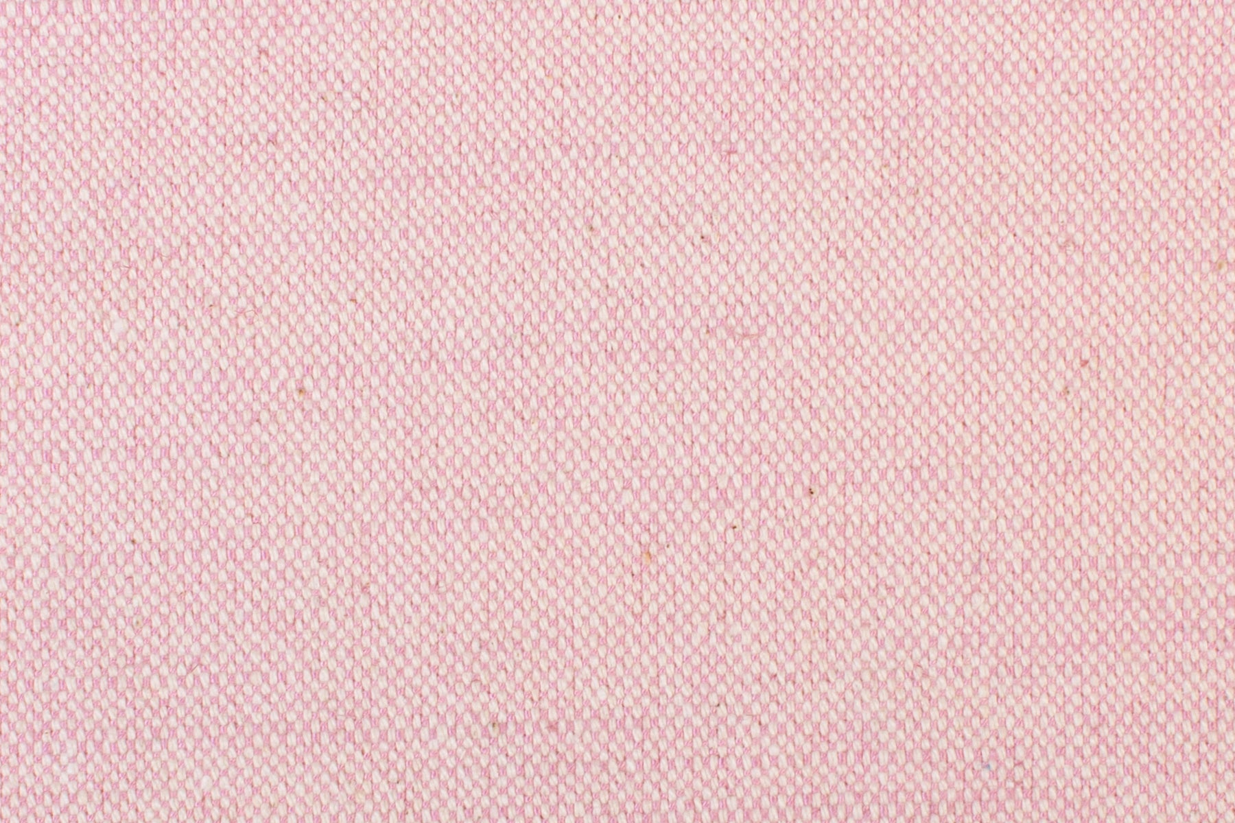 Detail of woven fabric yardage in textured bright pink.