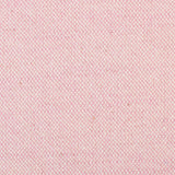 Detail of woven fabric yardage in textured bright pink.