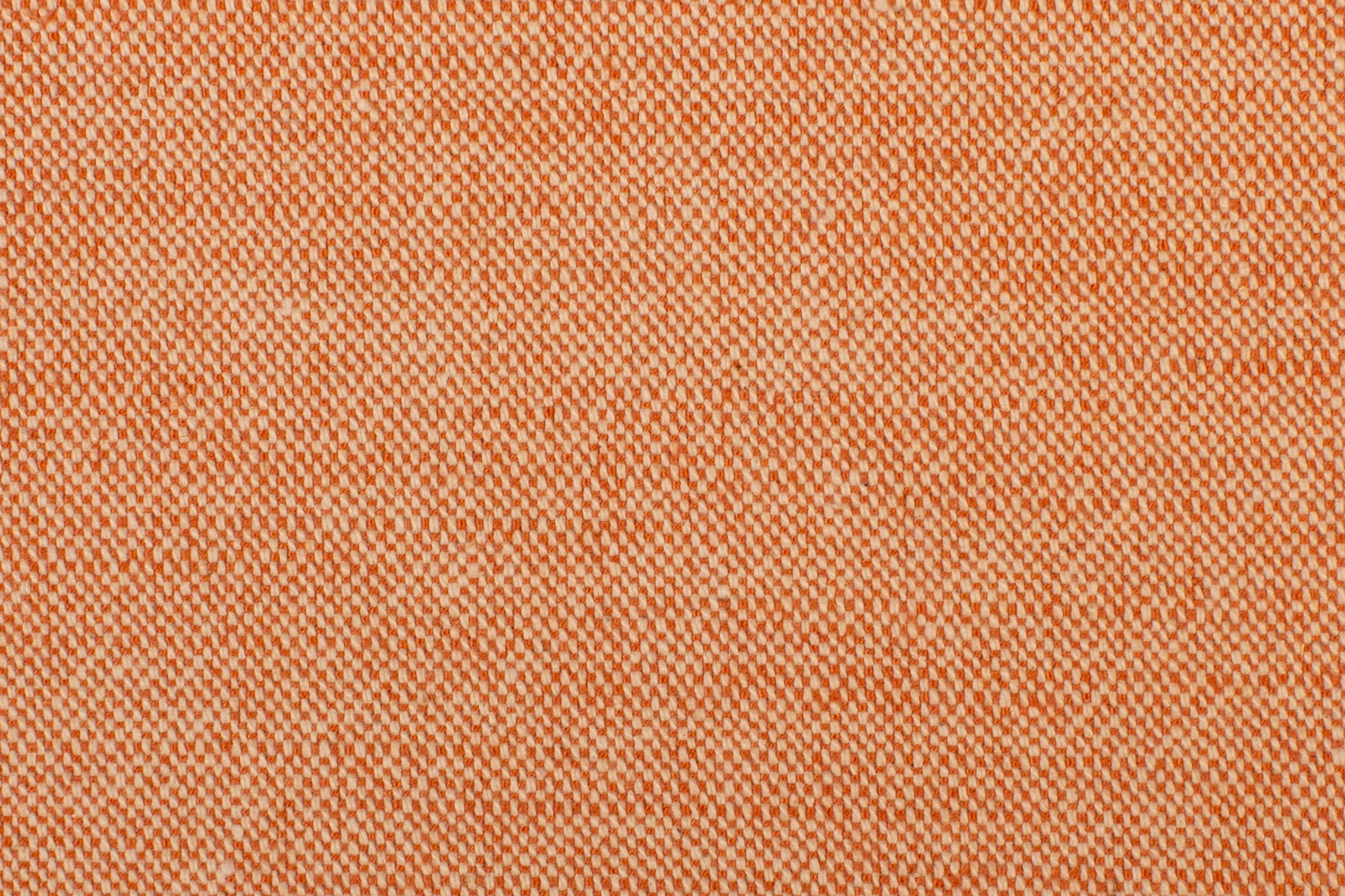 Detail of woven fabric yardage in textured orange.