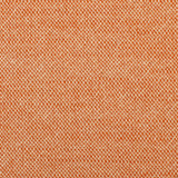 Detail of woven fabric yardage in textured orange.