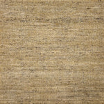 Textured handwoven carpet in beige. 